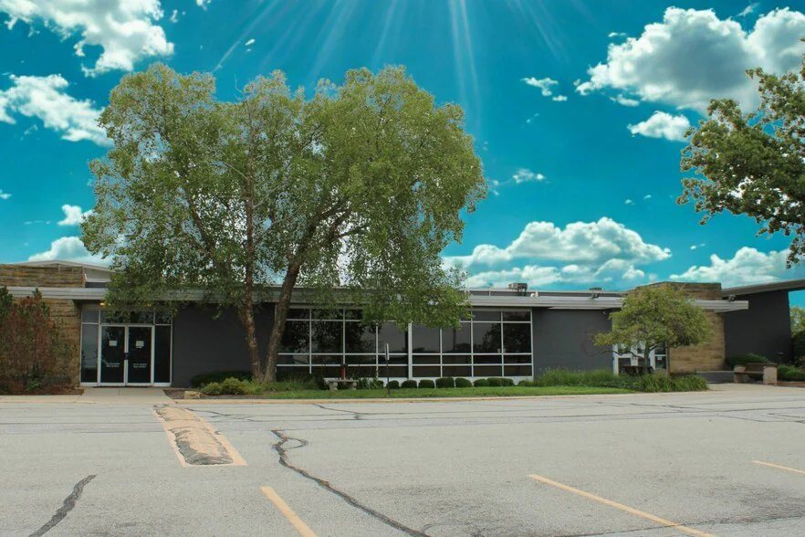 The former Ransburg YMCA building on a summer day